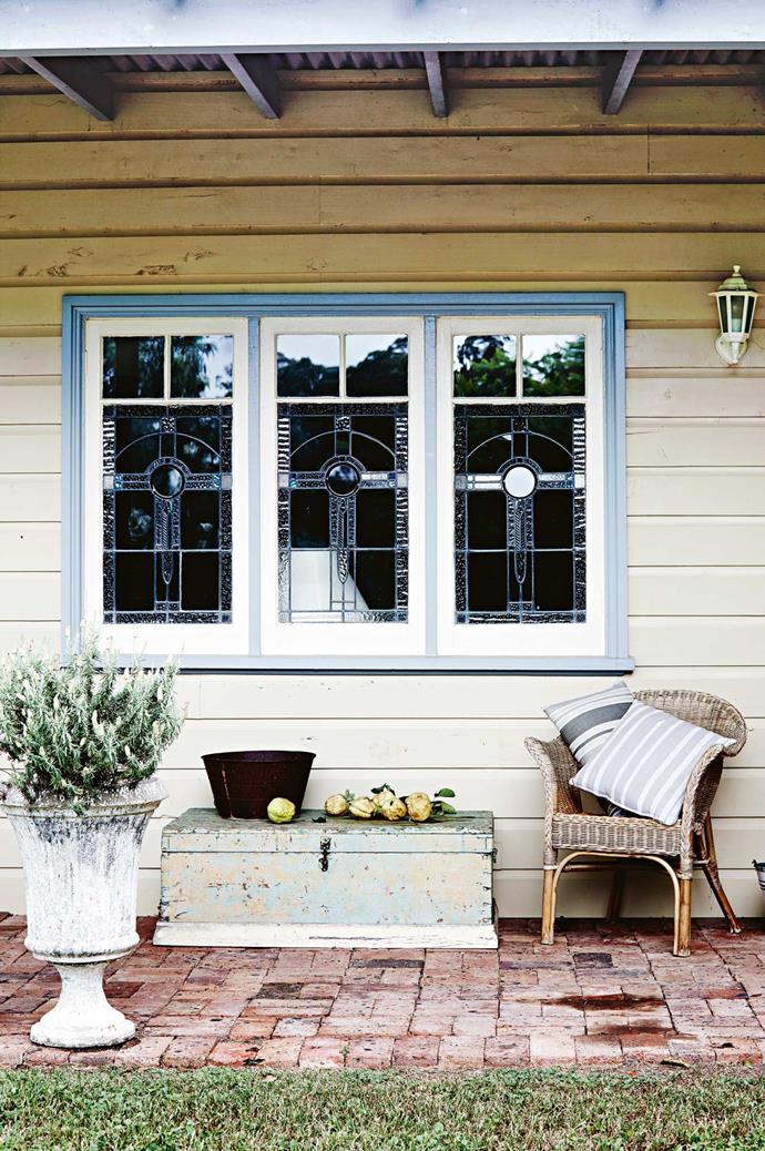A wicker chair on the [back verandah](https://www.homestolove.com.au/country-verandahs-13365|target="_blank") is the perfect place to sit back and relax. *Photo: Mark Roper*