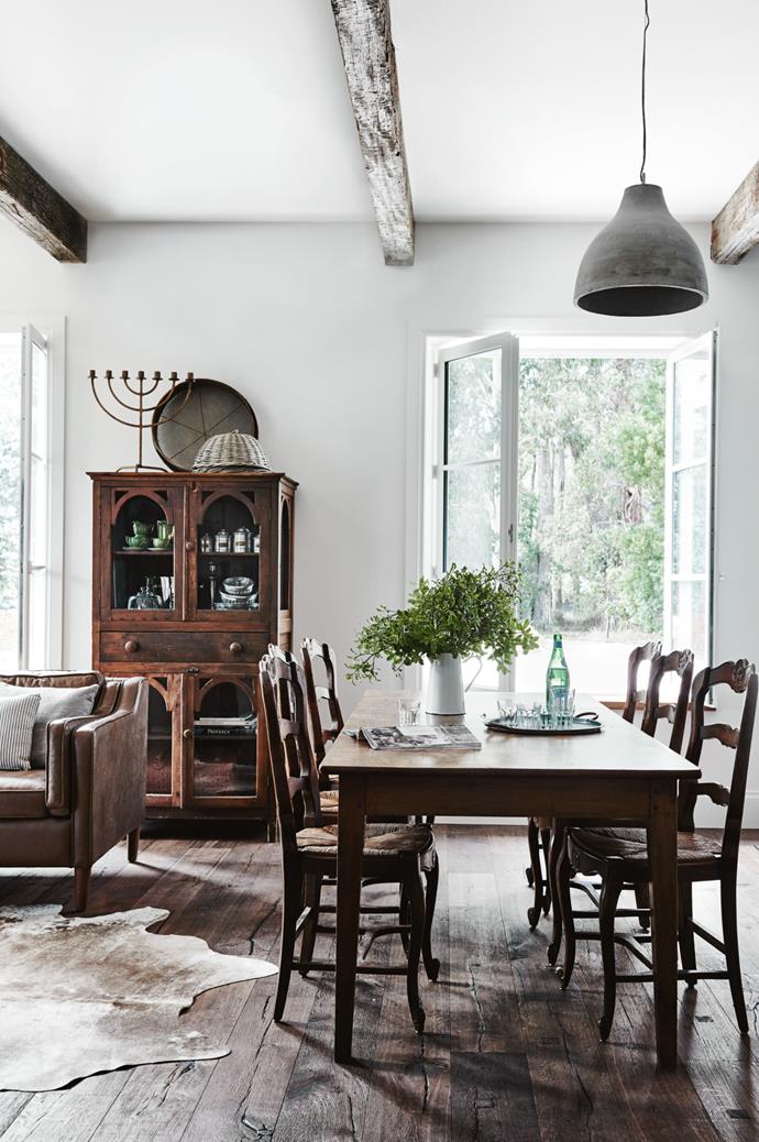 French provincial furniture and rustic exposed ceiling beams give them home an understated elegance.