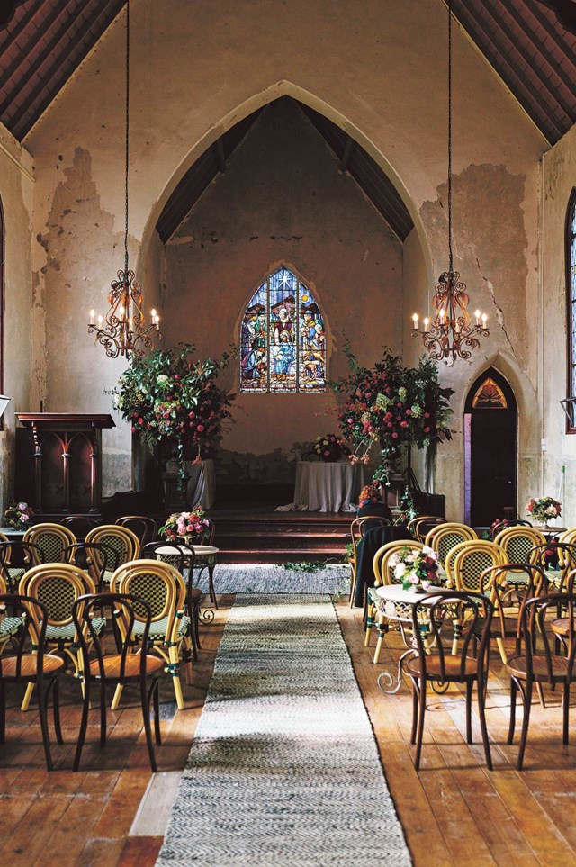 <p>**CHURCHILL, TARADALE, VIC**<P>
<p>Winter weddings often call for a theatrical setting, and there's no place higher on drama than [Churchill in Taradale](https://www.homestolove.com.au/historic-hall-wedding-12199|target="_blank"|rel="nofollow"). An old Anglican church – deconsecrated in 2010 – has been transformed into a premier wedding venue by floral designers [Prunella](http://www.prunella.com.au/|target="_blank"|rel="nofollow"). Stained-glass windows and aged sandstone are standout features of Churchill, which also enjoys spectacular garden views. Here, Prunella created a "moody, layered and ... wild abundant look," with urns brimming with bunches of deep red roses.<p>
<P>**For more information, visit [Churchill Events](http://www.churchillevents.com.au/|target="_blank"|rel="nofollow").**<p>
<P>*Photo: Jessica Tremp*<p>