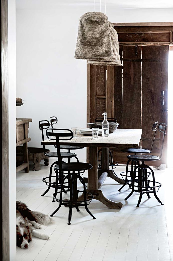 A Javanese table is matched with iron chairs Heidi has custom-made and -tinted in India.