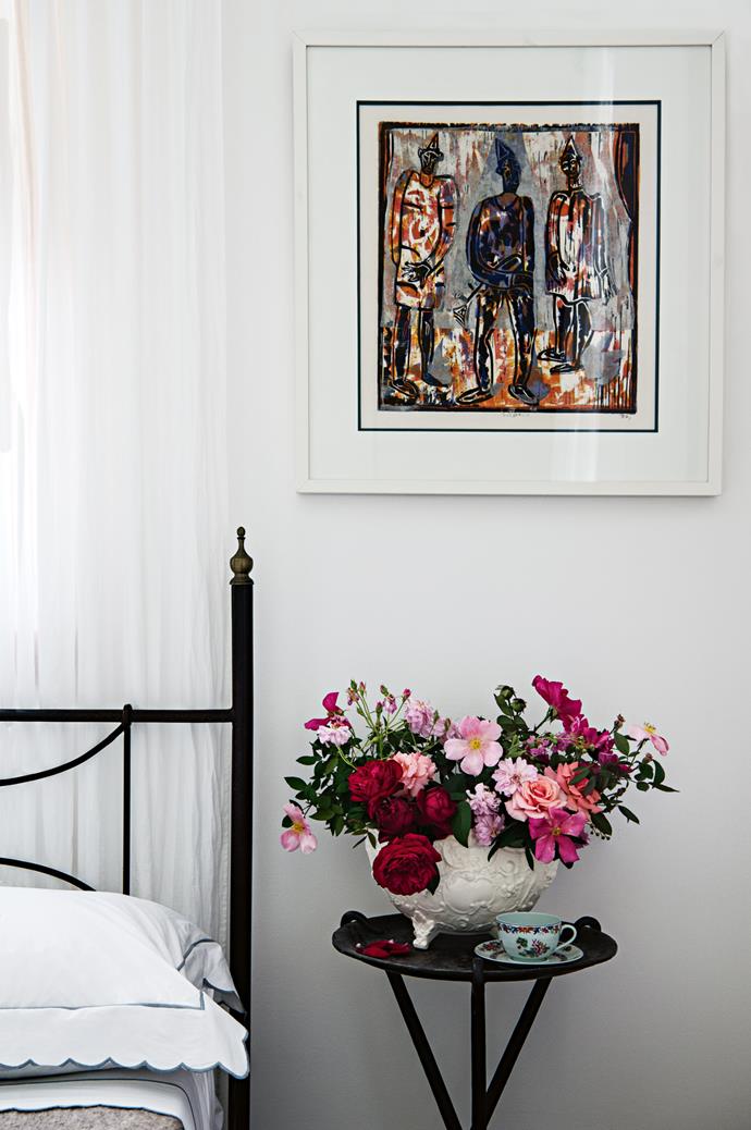 An artwork above the bedside table by Joe Furlonger depicts Pulcinella, who symbolises Armando's birth city of Naples.