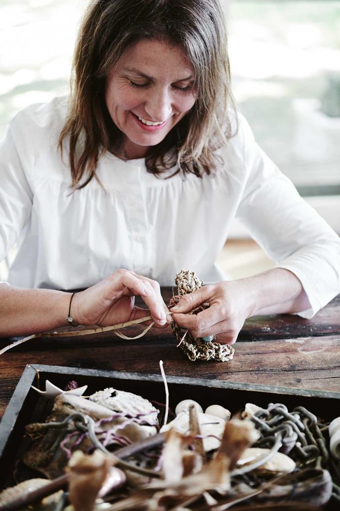 Kate working with some of her collected pieces, cording natural fibres from a red hot poker plant into a bag.  "I make really simple things with found objects from around the farm, or the tip," says Kate.