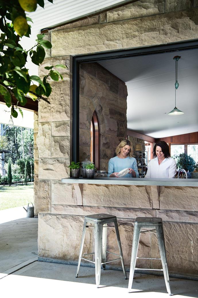 Emma with her mum Penny at the bar window that overlooks the garden from the kitchen. Every year, Penny makes a [traditional Christmas pudding](https://www.homestolove.com.au/grandmas-christmas-cake-10688|target="_blank"), using her grandmother's recipe and the original copper and silver sixpences.