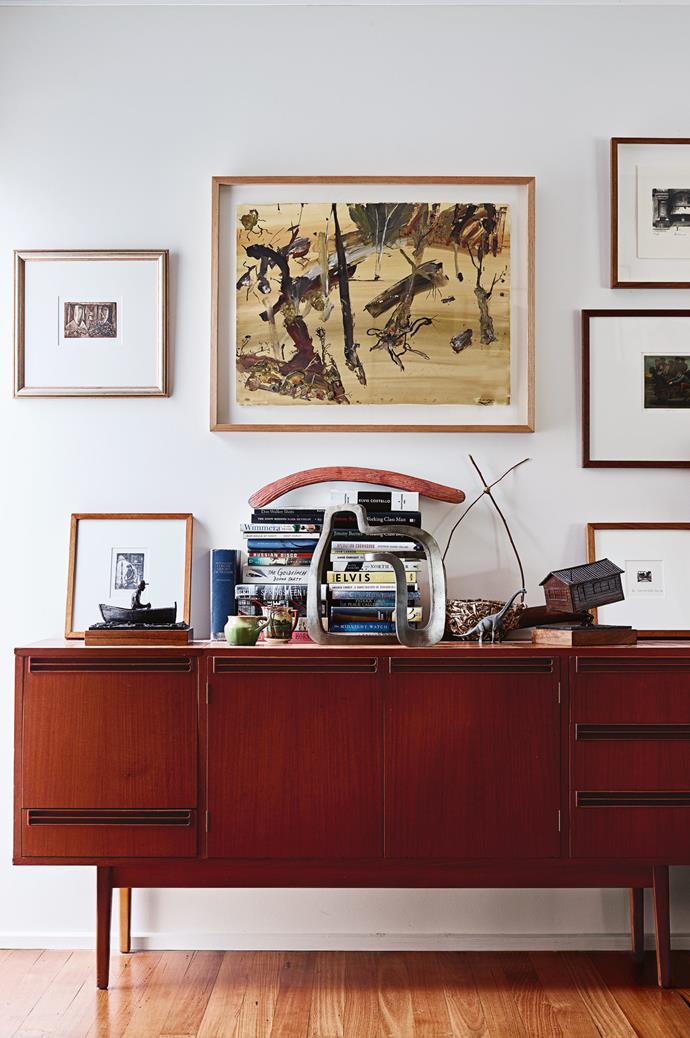 Much of David's art collection comes from swaps with other artists. A work by [John R. Walker](https://johnrwalker.com.au/) is centred above a Danish-style bureau David bought on eBay. The other works are also by friends including [Pro Hart](https://www.prohart.com.au/), [Rick Amor](http://www.rickamor.com.au/) and [Geoffrey Ricardo](http://www.geoffreyricardo.com/). David made the two bronze sculptures, while his wife Sarah made the basket. The large sculptural piece is by [Jamieson Miller](http://www.jamiesonmiller.com/).