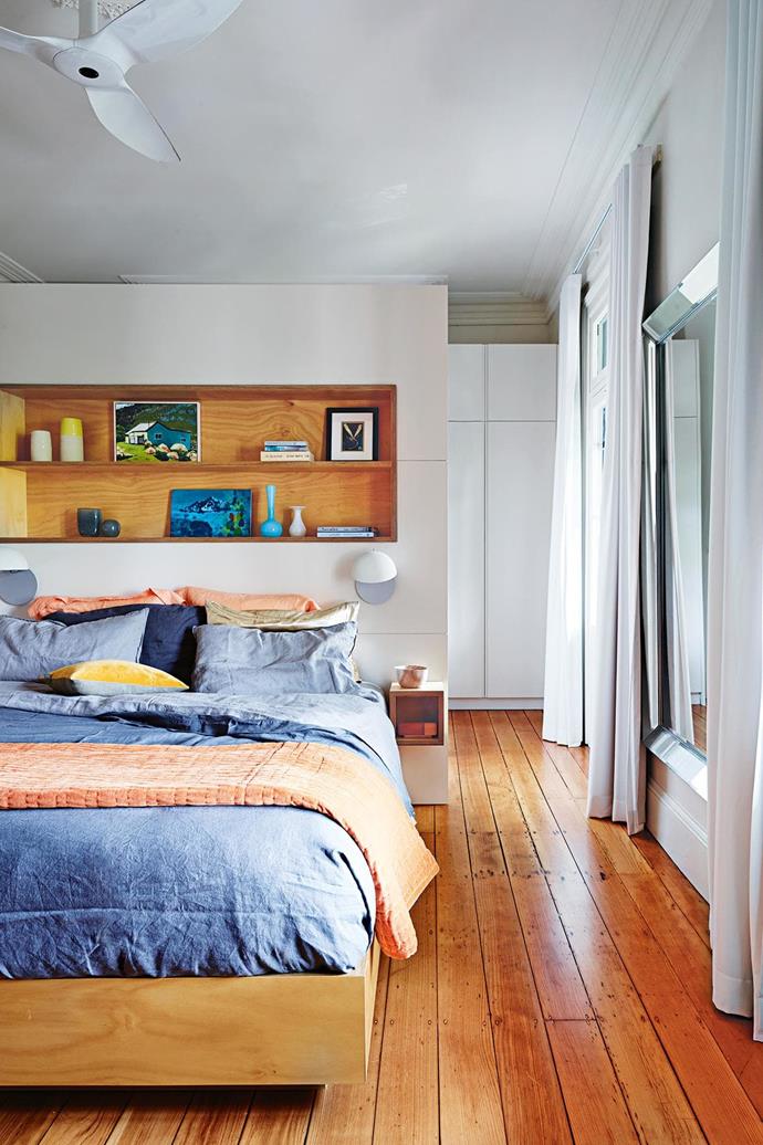 **Going up** A bedhead nib wall is a clever way to create a spacious [walk-through wardrobe](https://www.homestolove.com.au/whimsical-walk-in-wardrobes-18929|target="_blank"). Built-in storage almost reaches the ceiling to keep clutter hidden away, with open shelves offering space for display. *Design: [Olga Gruzdeff](http://olgagruzdeff.com/|target="_blank"|rel="nofollow"). Artwork: (bottom left) Rebecca Dent (on bottom shelf), Astro Art, 0412 352 429. Styling: Maria Dyoniziak. Photography: Anson Smart.*
