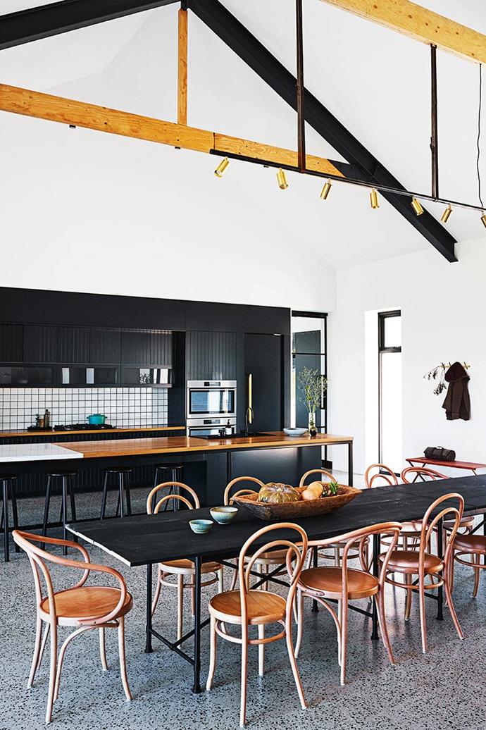 When it came to designing his parent's [dream country farm house](https://www.homestolove.com.au/step-inside-this-cosy-country-farmhouse-with-modern-interiors-17468|target="_blank"), *Inside Out* style editor Jono Fleming went for traditional elements such as exposed ceiling beams but kept things fresh and modern with matt black accents. *Photo: Anson Smart*