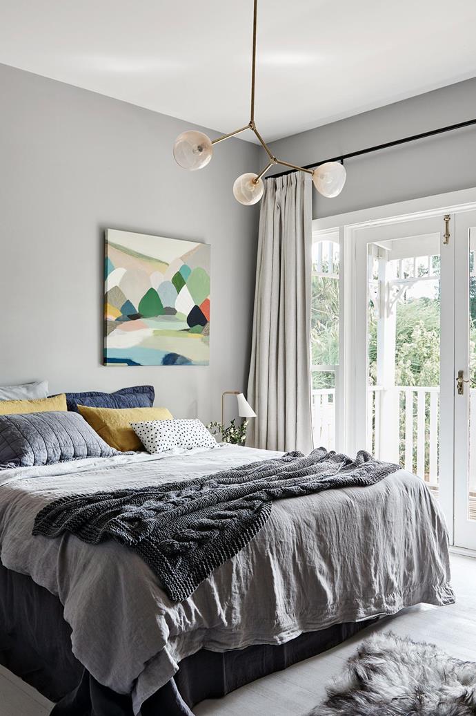 **Off centre**This bright Belynda Henry artwork is hung to the side of the bed, doing away with traditional symmetry. An array of cushions and bedlinen works to avoid an overly fussy look. *Design: [Suzanne Cunningham](http://www.onegirlinteriors.com.au/|target="_blank"|rel="nofollow"). Styling: Jacqui Moore. Photography: Eve Wilson.*