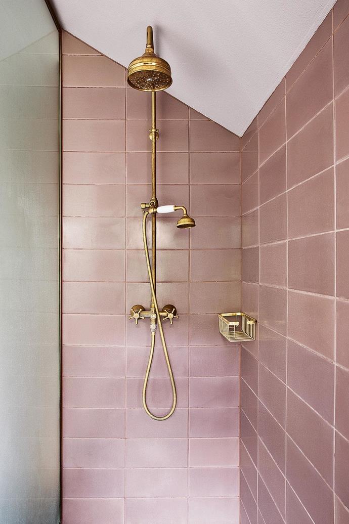 Pink and brass is the ultimate glam bathroom colour combination. The Prahan townhouse auctioned off in 2015 by [Bec and Chris Judd](https://www.homestolove.com.au/becca-and-chris-judd-are-auctioning-off-their-townhouse-4367|target="_blank") featured a pink, marble and brass bathroom.