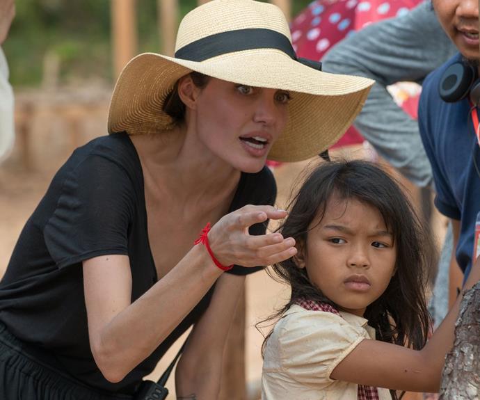 Angelina with cast members in Cambodia. *Pic Credit: Splash*