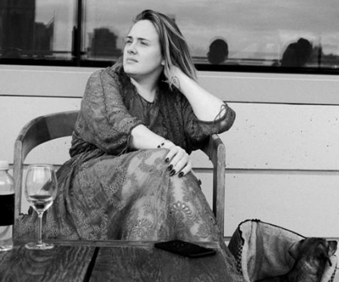 Adele takes a break with a glass of vino in this moody Insta.
