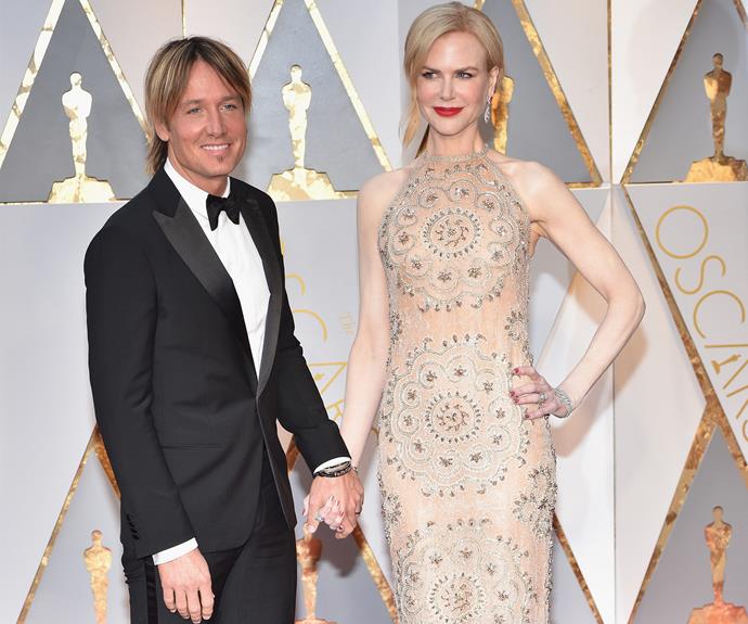 Hand-in-hand with her leading man, kuzzle king, Keith Urban