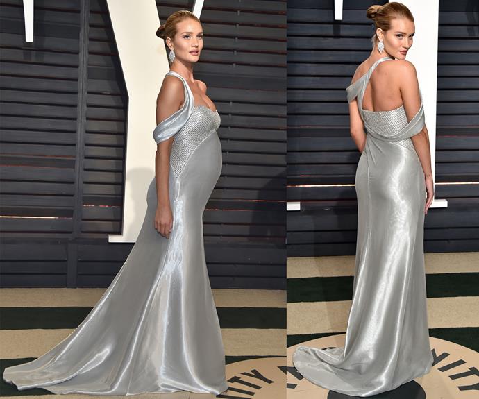Rosie Huntington-Whiteley looked radiant in this glamorous gown. The supermodel emulated bumpalicious beauty while expecting her first child with fiancée Jason Statham.