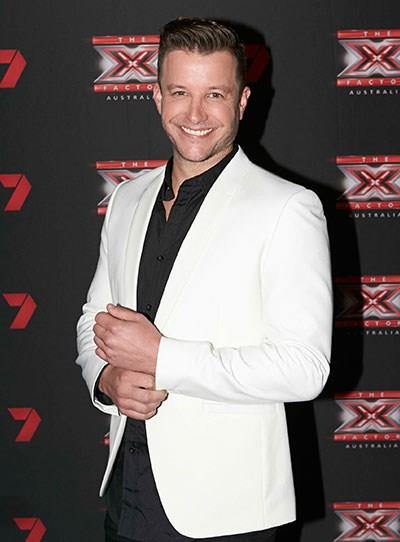 **Luke Jacobz**
<br><br>
Luke is now known for his role as the cop (and later bar owner) Angelo in *Home And Away* and as the host of *The X-Factor*. The actor attracted new fans and showed a candid side to himself when he competed in *[I'm A Celebrity... Get Me Out of Here!](https://www.nowtolove.com.au/reality-tv/im-a-celebrity-get-me-out-of-here/im-a-celebrity-luke-jacobz-eliminated-54137|target="_blank")* in 2019. Next up, he'll return to Summer Bay, reprising his role as Angelo.