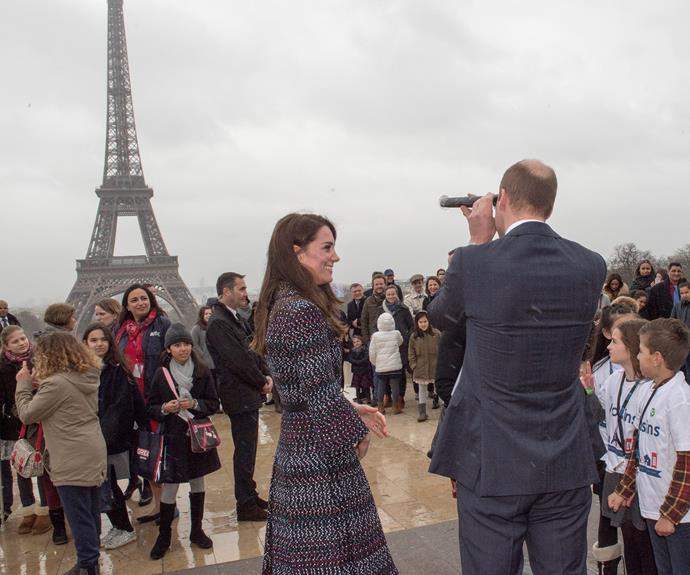 While the couple's two children - Prince George, three, and Princess Charlotte, one - didn't join their parents, William still showed off his dad side when he decided he needed extra help checking out the Eiffel Tower.