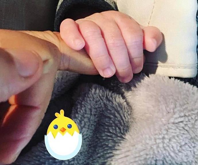 Cheryl's hairstylist sent fans into overdrive with this pic, which they believed was her bub's tiny hand.