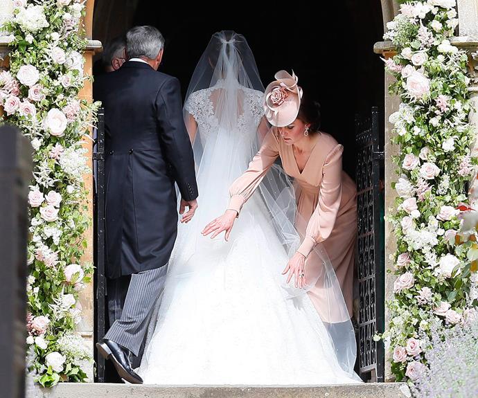 Catherine returned the favour at [Pippa's wedding to James Matthews](https://www.nowtolove.com.au/royals/british-royal-family/pippa-middleton-marries-james-matthews-37442|target="_blank"), and the ever-adorable Prince George and Princess Charlotte even played a part in the bridal party. *(Image: Getty Images)*