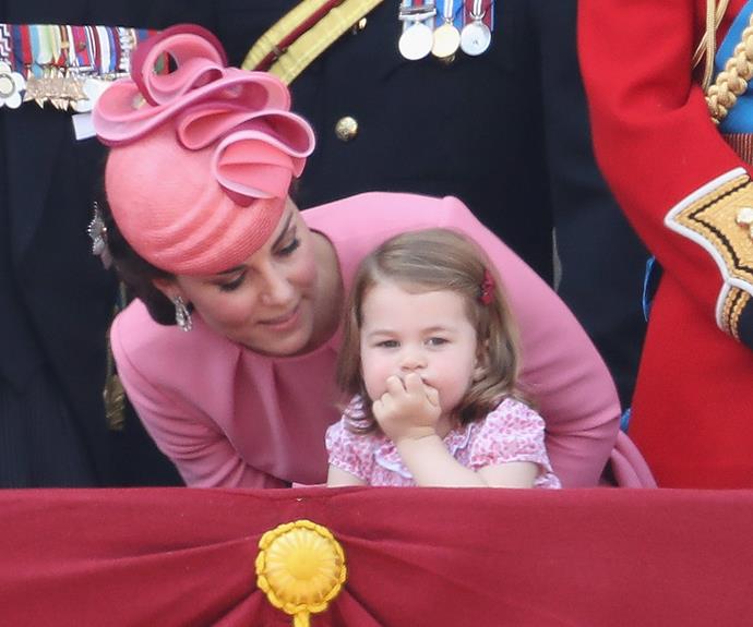 Charlotte's locks were pinned back with a tiny maroon bow.