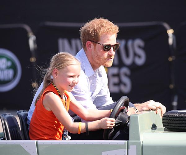 He's the king of the kids! The 33-year-old joked around with a little girl at the Jaguar Land Rover Driving Challenge ahead of the Games.