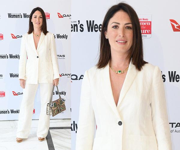 Sara McGrath keeps it classic in a tailored white suit.