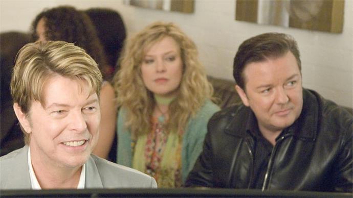 **David Bowie –** ***Extras***
**Ricky Gervais**’s follow-up to *The Office* is littered with cameos as Gervais’s vain actor slumming it as an extra meets the likes of **Sir Patrick Stewart**, **Daniel Radcliffe**, **Ben Stiller**, Coldplay’s **Chris Martin** and **Kate Winslet**. The highlight, however, was a chance meeting with the legendary **David Bowie** in a bar. Before you can say “Ziggy Stardust”, Gervais is being serenaded, and ridiculed, by his musical hero to the strains of a new Bowie/Gervais composition, “Little Fat Man.”