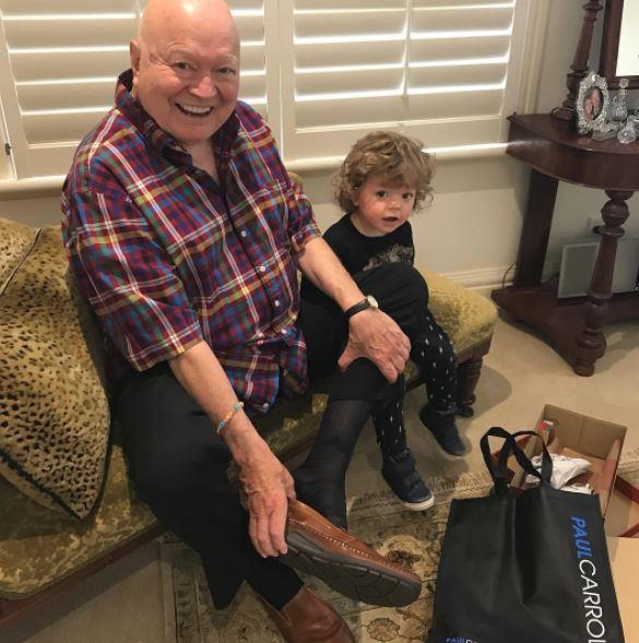 **Bert Newton**: The celebrated entertainer adores spending time with his four grandchildren, including trying on shoes with the super-sweet little Monty!