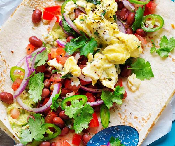 **Scrambled eggs, smashed avocado and bean breakfast wrap**.
<br><br>
Rise and shine with this hearty and delicious scrambled egg, smashed avocado and bean breakfast wrap, which will provide you with lots of wholesome energy to last throughout the day.
<br><br>
[Find the full recipe here](https://www.womensweeklyfood.com.au/recipes/scrambled-eggs-smashed-avocado-and-bean-breakfast-wrap-29253|target="_blank").