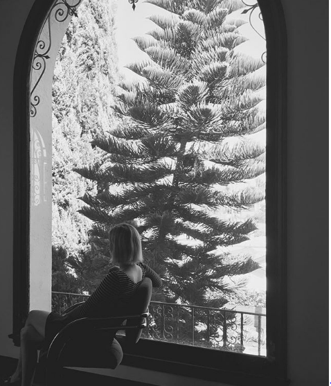 Actress Emma Roberts simply welcomed the Christmas season with her caption "'tis the season...".