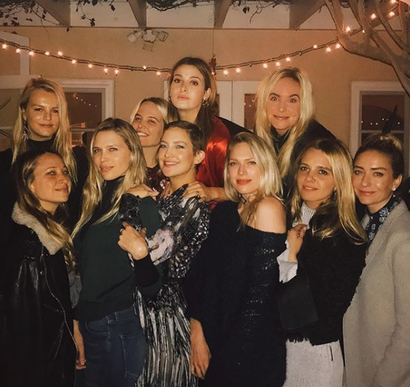 Kate Hudson proved she's no different than the rest of us by celebrating her first Christmas bash of the season with her nearest and dearest gal pals.