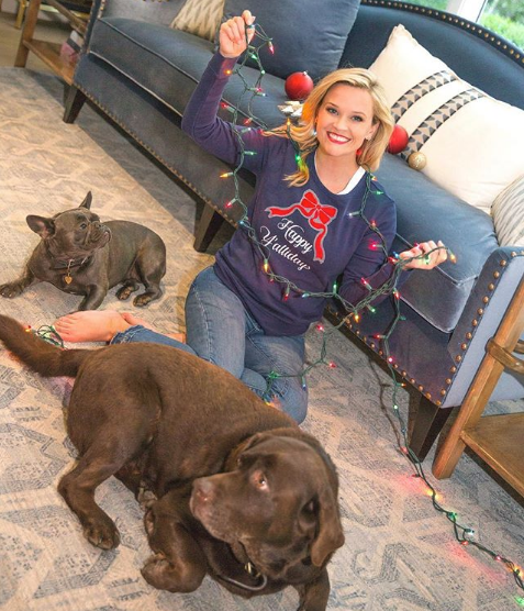 Dressed in a Christmas sweater, our favourite Southern Bell Reese Witherspoon asked her followers: "Who's getting decorations up today?! #HappyYallidaysfolks!"