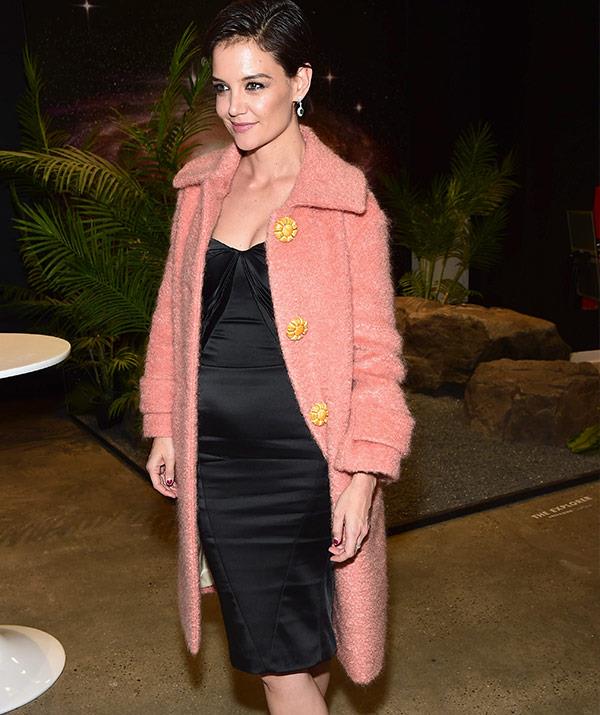 Katie looked gorgeous in this fluffy pink coat and strapless black gown.