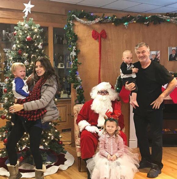 If you've ever taken a child to get a Santa photo, you probably will be able to relate to now-pregnant Hilaria Baldwin, pictured here with the always-photogenic Alec Baldwin. Can't. Stop. Laughing.