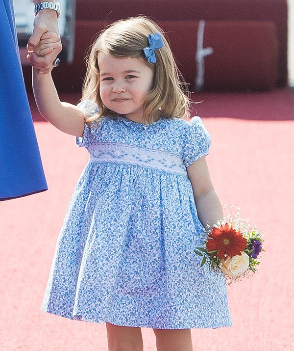 Just like mummy, Charlotte recycled this glorious sun dress.