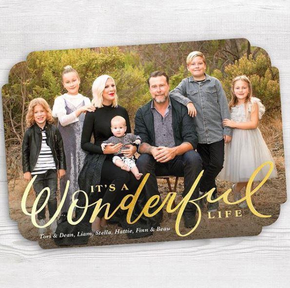 Tori Spelling and Dean McDermott put on a strong, united front for their family's holiday photo. This comes just two months after Tori revealed that the birth of the pair's seven-month-old son, Beau, reignited the pair's love for each other... And just in time for Christmas!