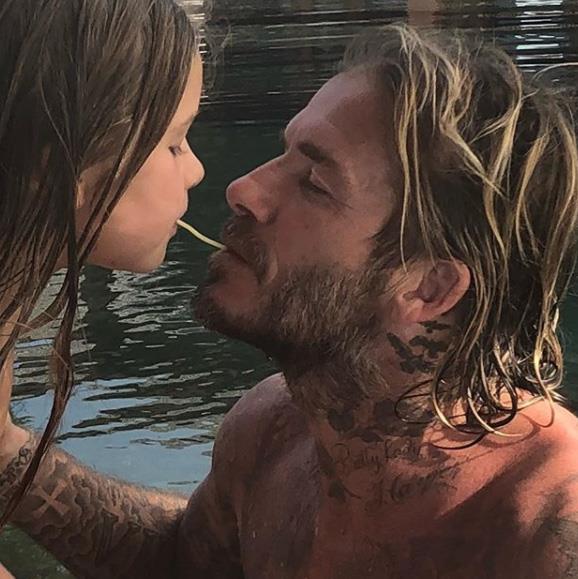 Former star footballer, David Beckham, posed with his youngest child, Harper, pretending to share a piece of spaghetti as they re-enacted the memorable scene from Disney film *Lady And The Tramp*. The sweet father-daughter moment was captured by proud mum Victoria, who posted it to Instagram with the caption: "The best daddy in the world x We Love u so so much. Kisses."