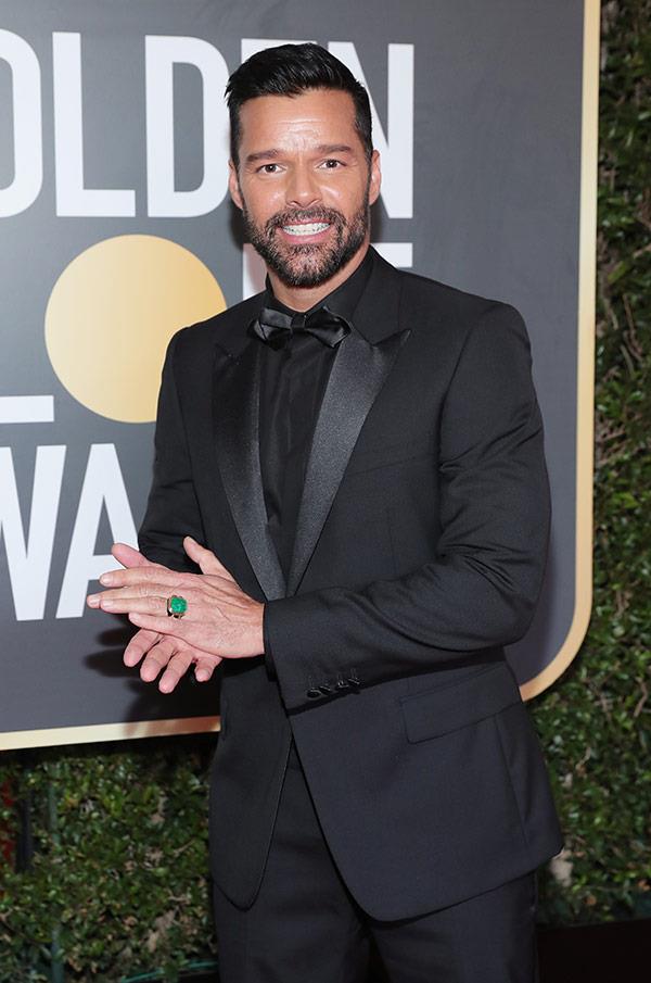 Ricky Martin rocks an all-black tux and a bright green ring.
