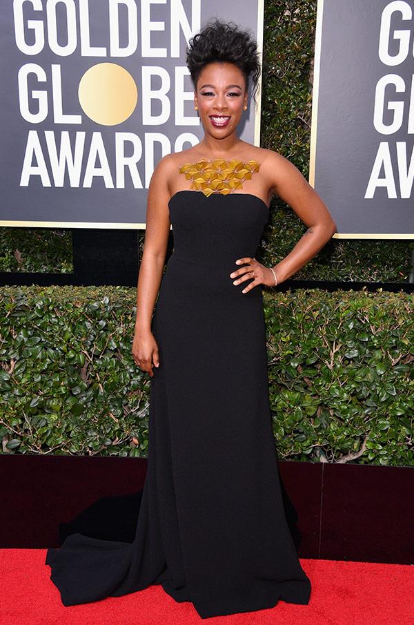 *Orange is the new Black* star Samira Wiley steps out in a strapless dress with an intricate neck-piece.