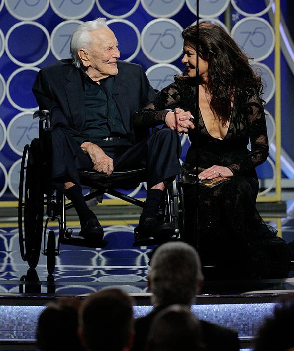 What a moving moment! 101-year-old [Kirk Douglas presents an award](https://www.nowtolove.com.au/celebrity/celeb-news/kirk-douglas-joins-catherine-zeta-jones-at-golden-globes-44052|target="_blank") with daughter-in-law Catherine Zeta Jones.