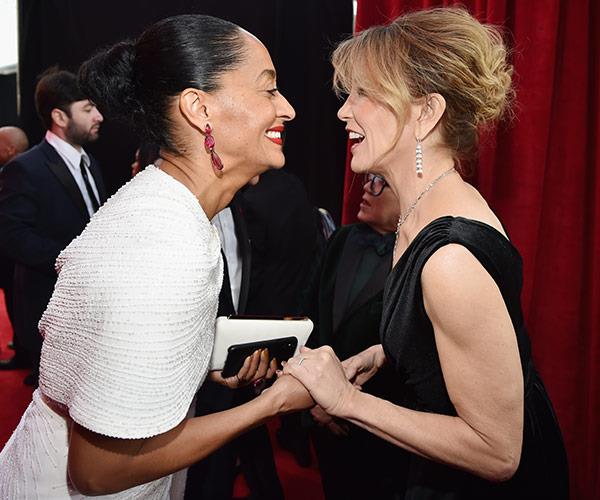 Tracee Ellis Ross and Felicity Huffman share a laugh.
