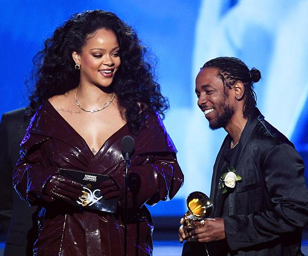 Rih Rih and Kendrick pick up their accolade for *Loyalty*.