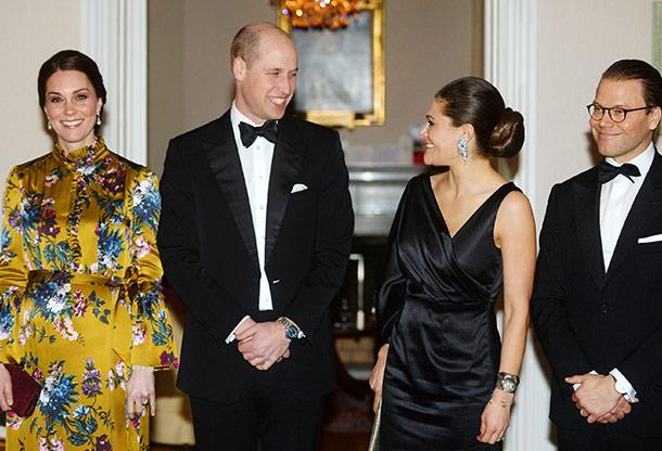 A royal night out! The couples share a laugh.