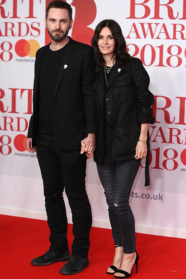 Courteney Cox, 53, and her fiance Irish singer Johnny McDaid, 41, couple-dressed in black for the night.