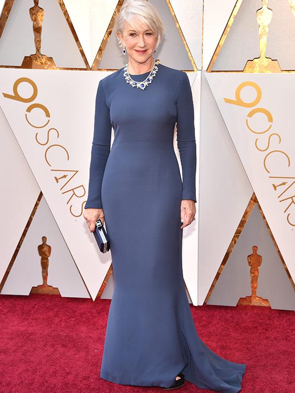 She seriously never gets it wrong. Dame Helen Mirren living up to her prestigious title in a custom deep blue dress by Reem Acra.