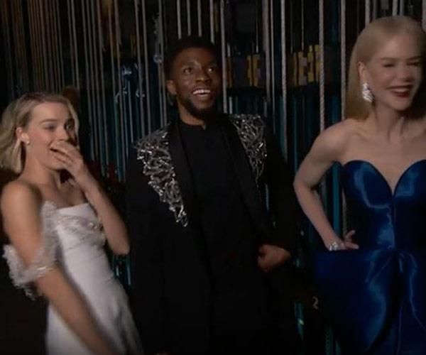 The Aussie squad! Margot Robbie and Nicole Kidman share a giggle backstage.