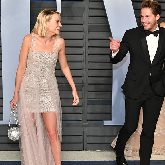 Aussie actress Margot Robbie and her husband Tom Ackerley put on a cute display as they arrive at the Vanity Fair's Academy Awards after party.
