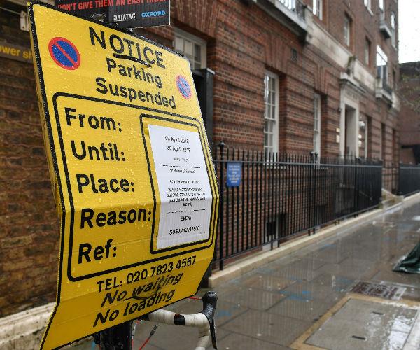 Temporary parking restrictions are in place outside the Lindo Wing at the Paddington-based St. Mary's Hospital, signaling the imminent arrival of royal baby number three.