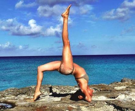 Meghan loves a beachside yoga stretch!