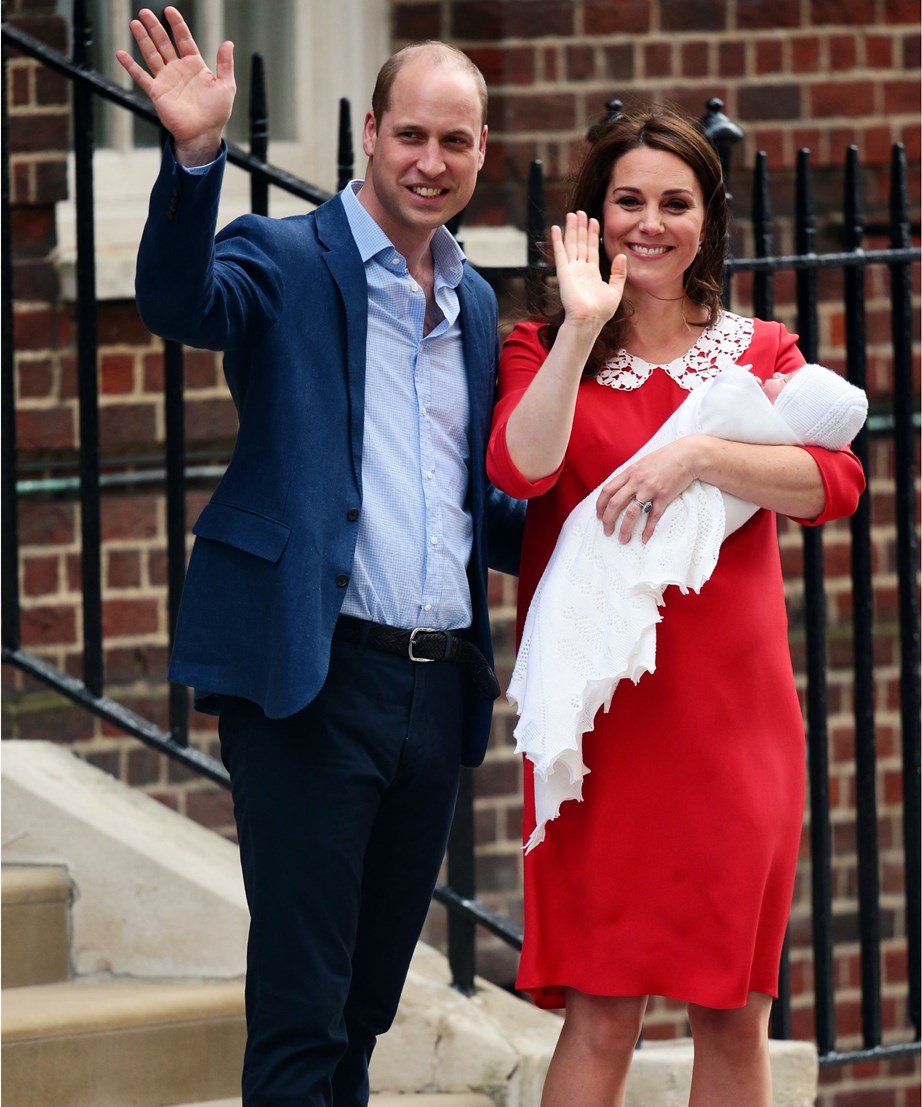 Prince William and Kate pose on the steps of St Mary's Hospital with their new baby boy, just hours after he was born. *(Image: Getty)*