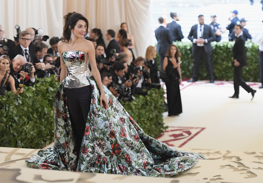 Met Gala Host Amal Clooney arrives to the Heavenly Bodies: Fashion & The Catholic Imagination Costume Institute Gala at The Metropolitan Museum of Art.
