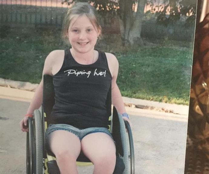 Nikita, age 8, in her wheelchair.