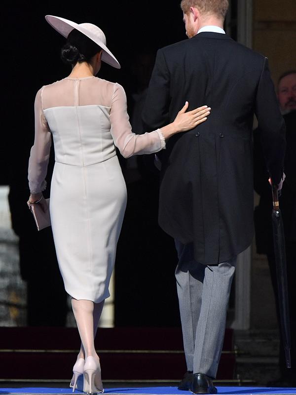 Meghan stepped out in pantyhose, thought to be a mandate of royal dressing, for the first time.